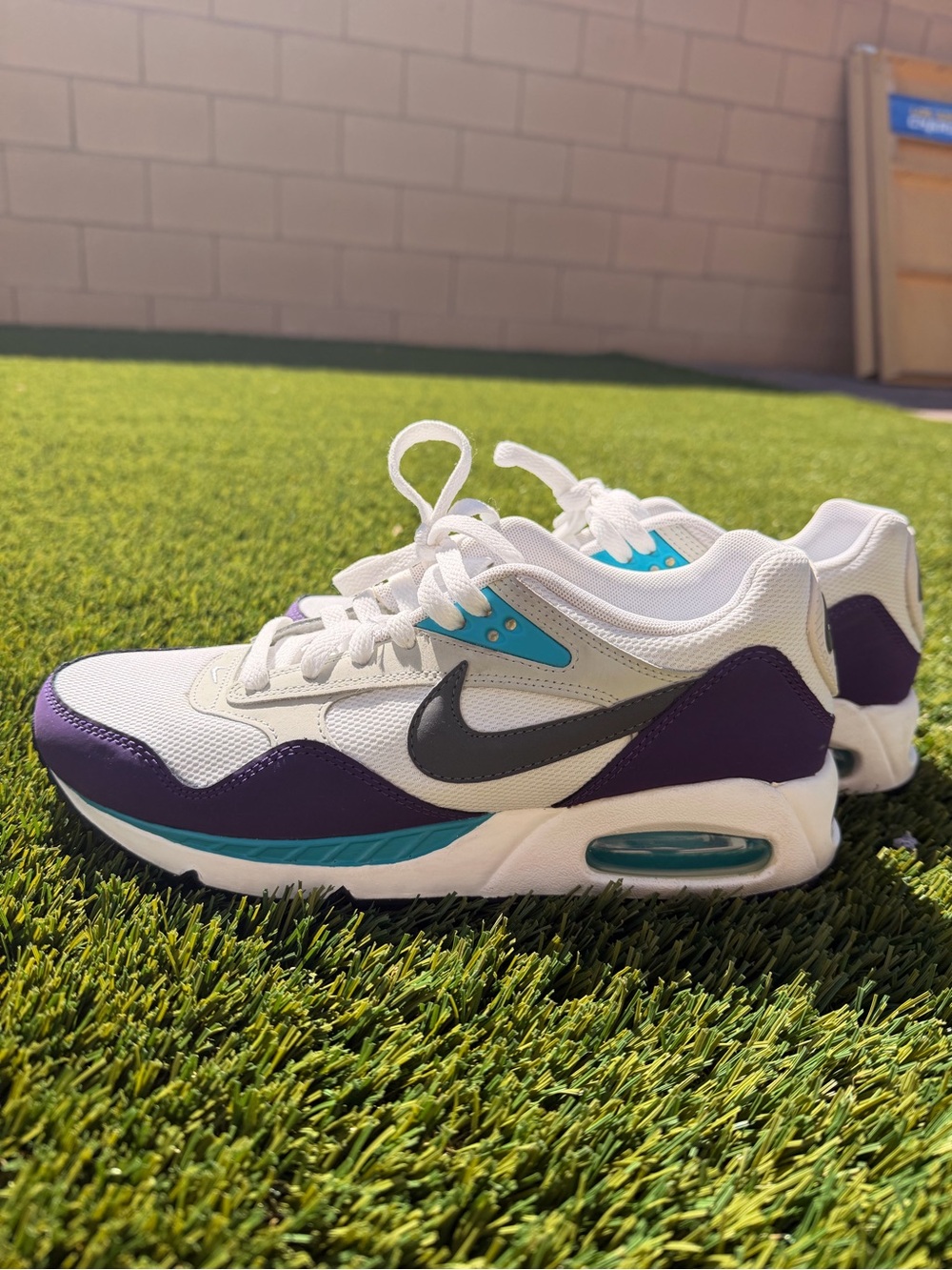 Nike White Sneakers with Purple, Teal & Black Accents